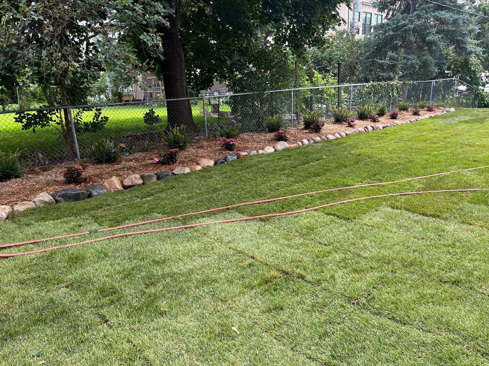 Gallery photos for Backyard Transformation with Fire Pit and Lush Landscaping: Image #2