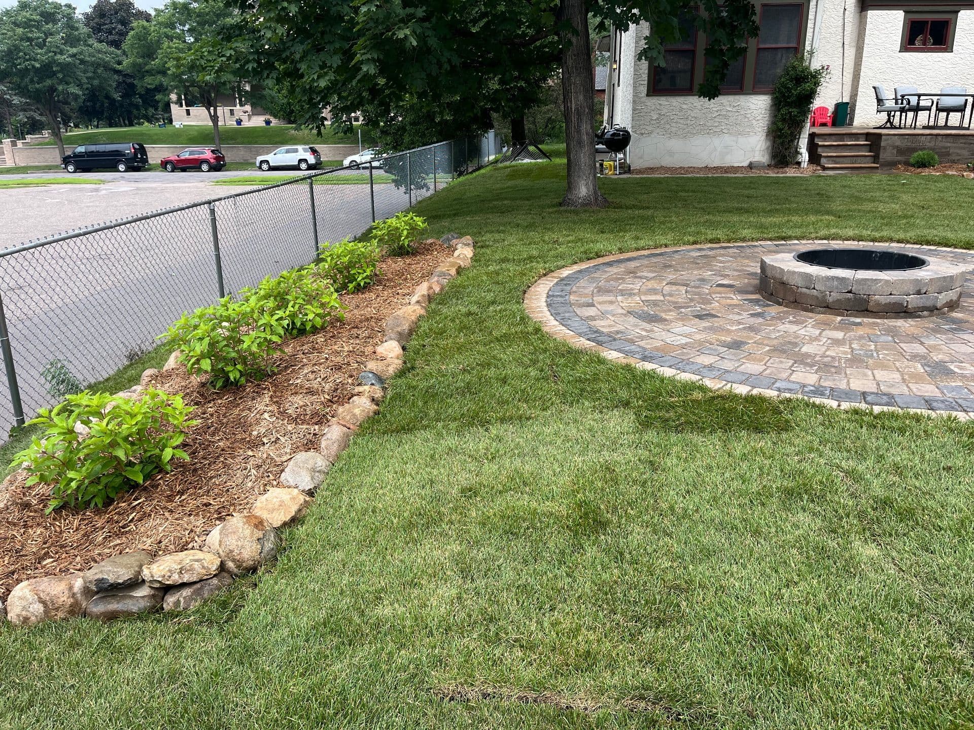 Gallery photos for Backyard Transformation with Fire Pit and Lush Landscaping: Image #3