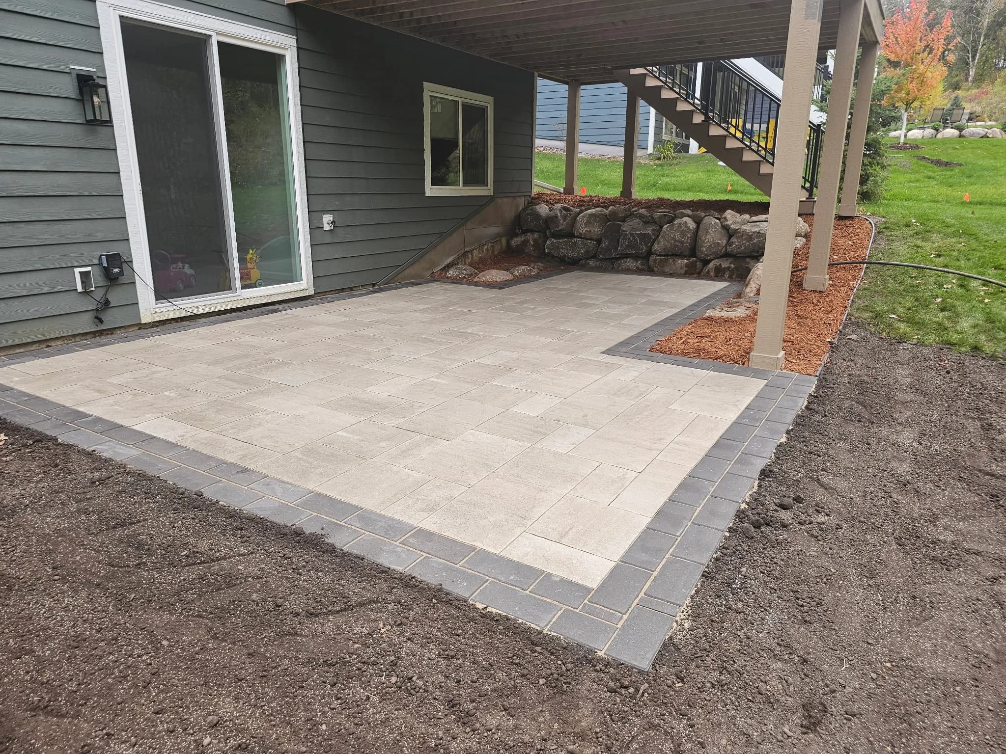 Project Paver Patio and Boulder Wall Install in Cottage Grove image