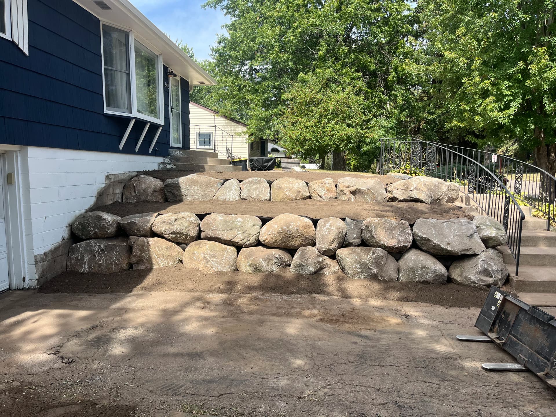 Tiered Boulder Wall Keeps This Oakdale Yard in Check image