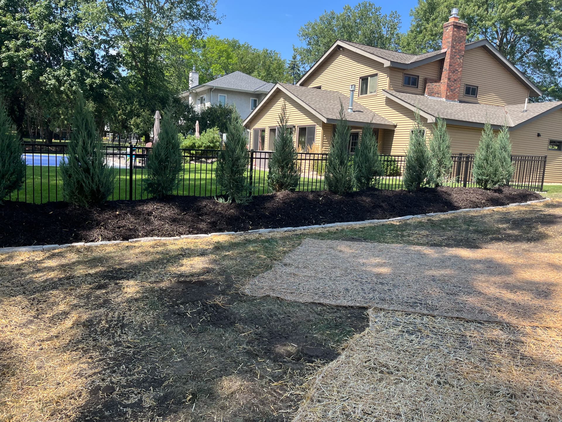 Gallery photos for Tiered Boulder Walls and Privacy Berm Done Right in New Brighton: Image #1